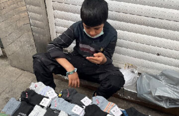 IRAN | AUG. 16, 2021 — Boy Selling Socks Receives SD Card with Christian Literature